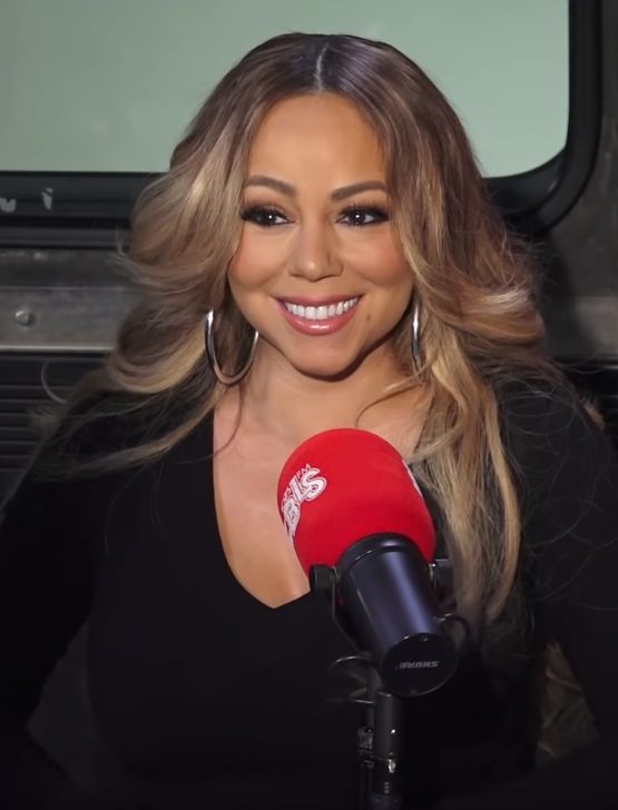 Mariah Carey smiling during a radio interview in November 2018